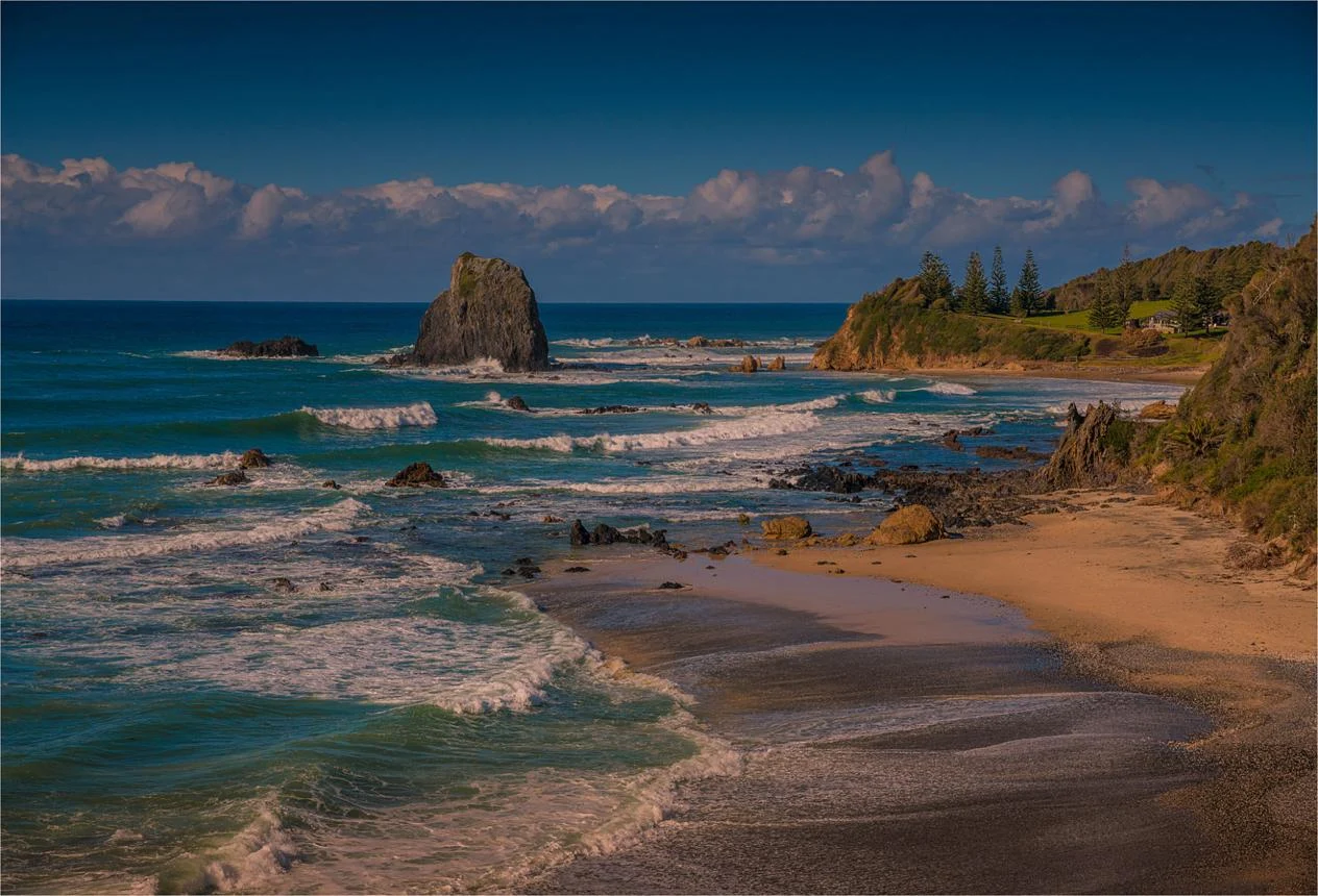 Een kustbeeld uit het reisboek bij Narooma